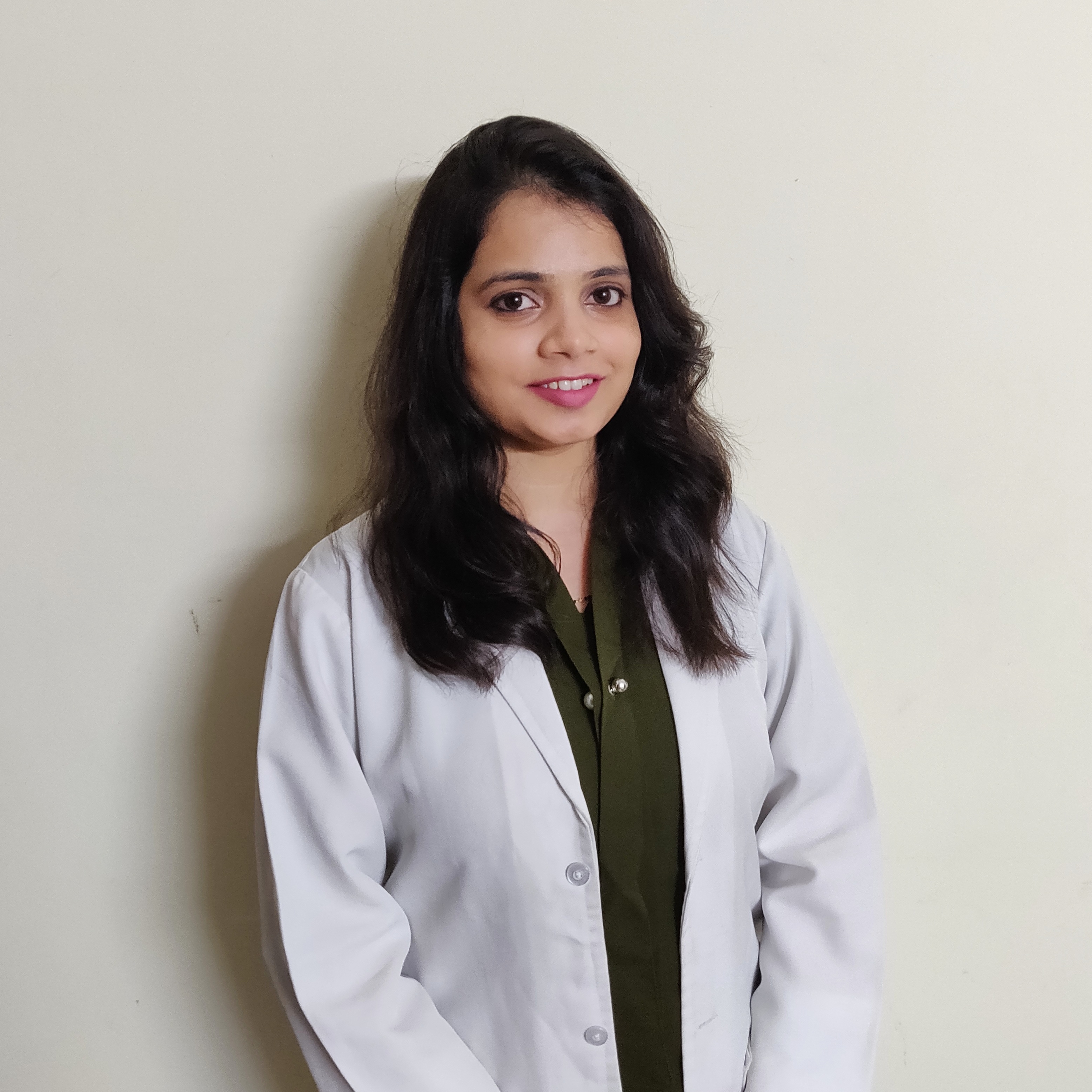 Dr. Varsha C B