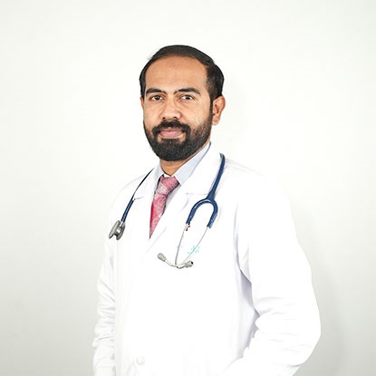 Dr.  Dheeraj S